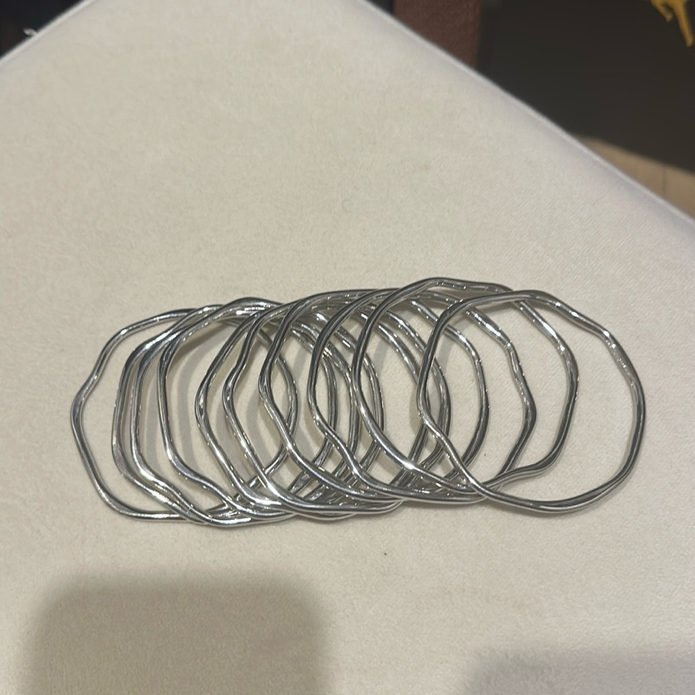 10 SILVER TONE BANGLES